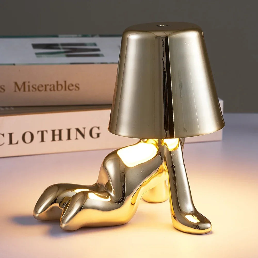Lampe de chevet design petit bonhomme en métal tactile or et argent