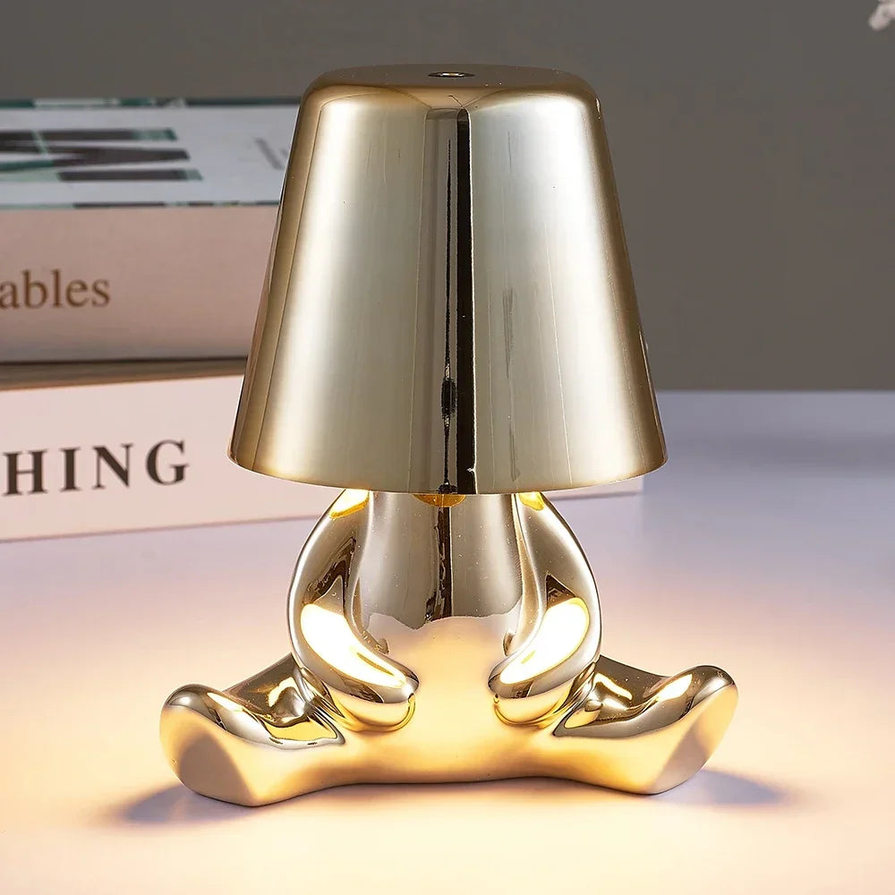 Lampe de chevet design petit bonhomme en métal tactile or et argent