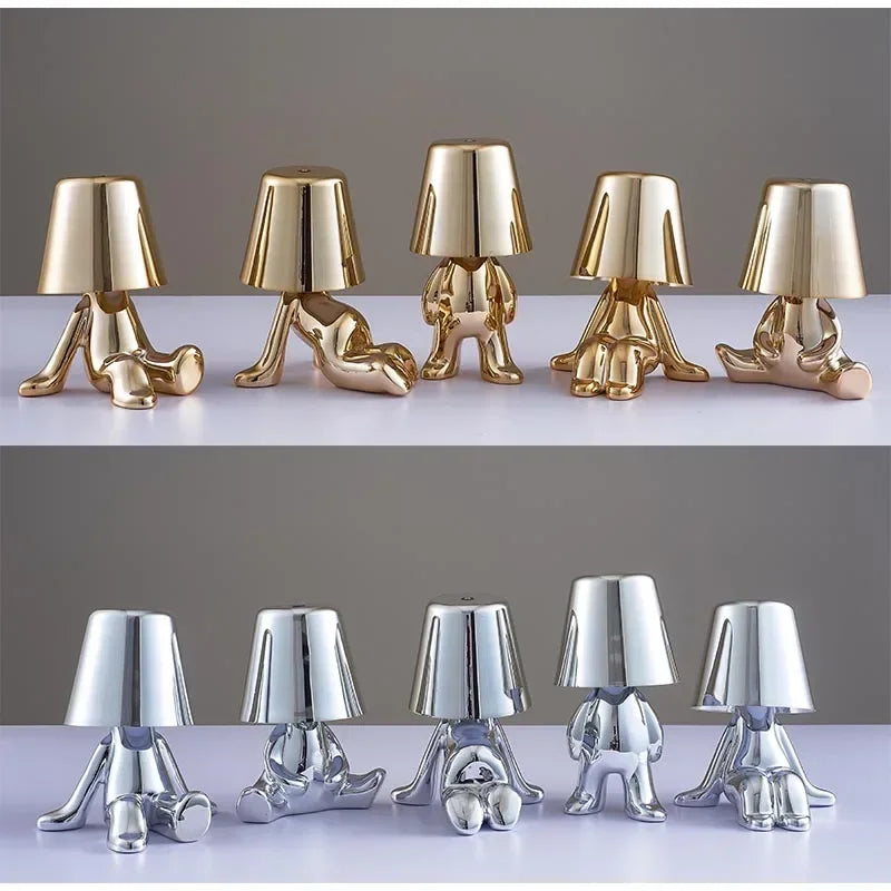 Lampe de chevet design petit bonhomme en métal tactile or et argent
