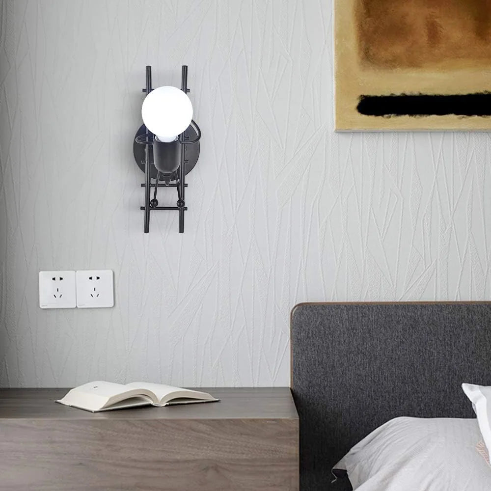 Lampe de chevet murale en métal en forme de bonhomme sur une échelle