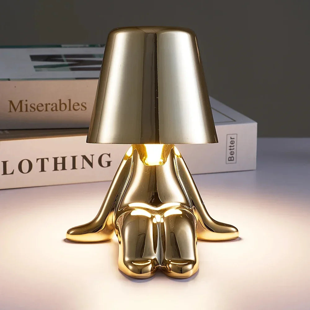 Lampe de chevet design petit bonhomme en métal tactile or et argent
