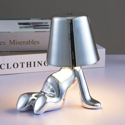Lampe de chevet design petit bonhomme en métal tactile or et argent
