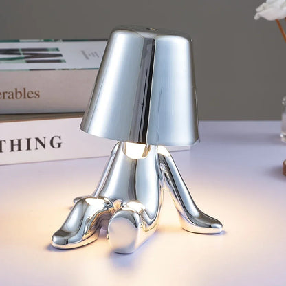 Lampe de chevet design petit bonhomme en métal tactile or et argent