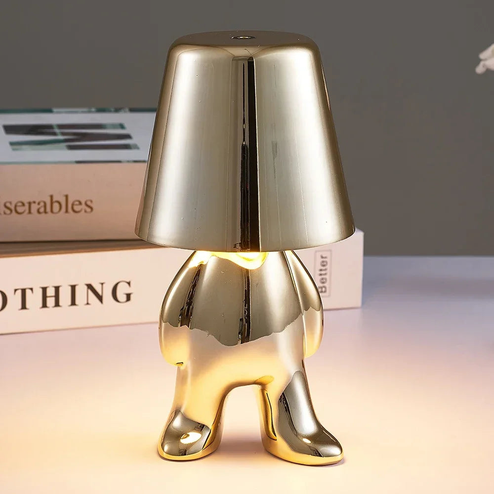 Lampe de chevet design petit bonhomme en métal tactile or et argent