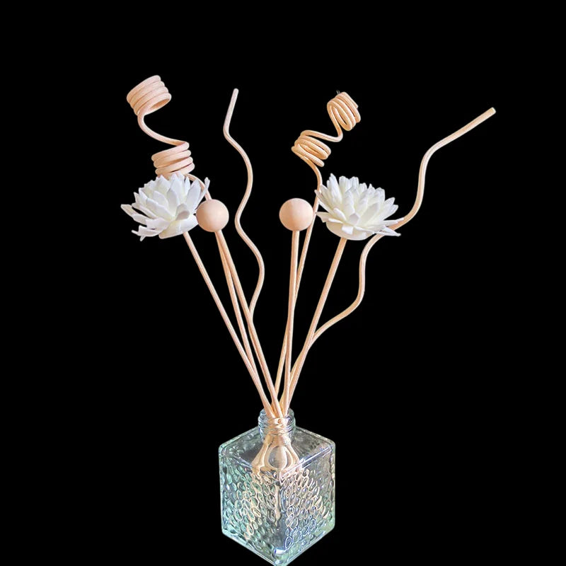 Fleurs diffusantes blanc crème en bois de sola sur tiges rotin